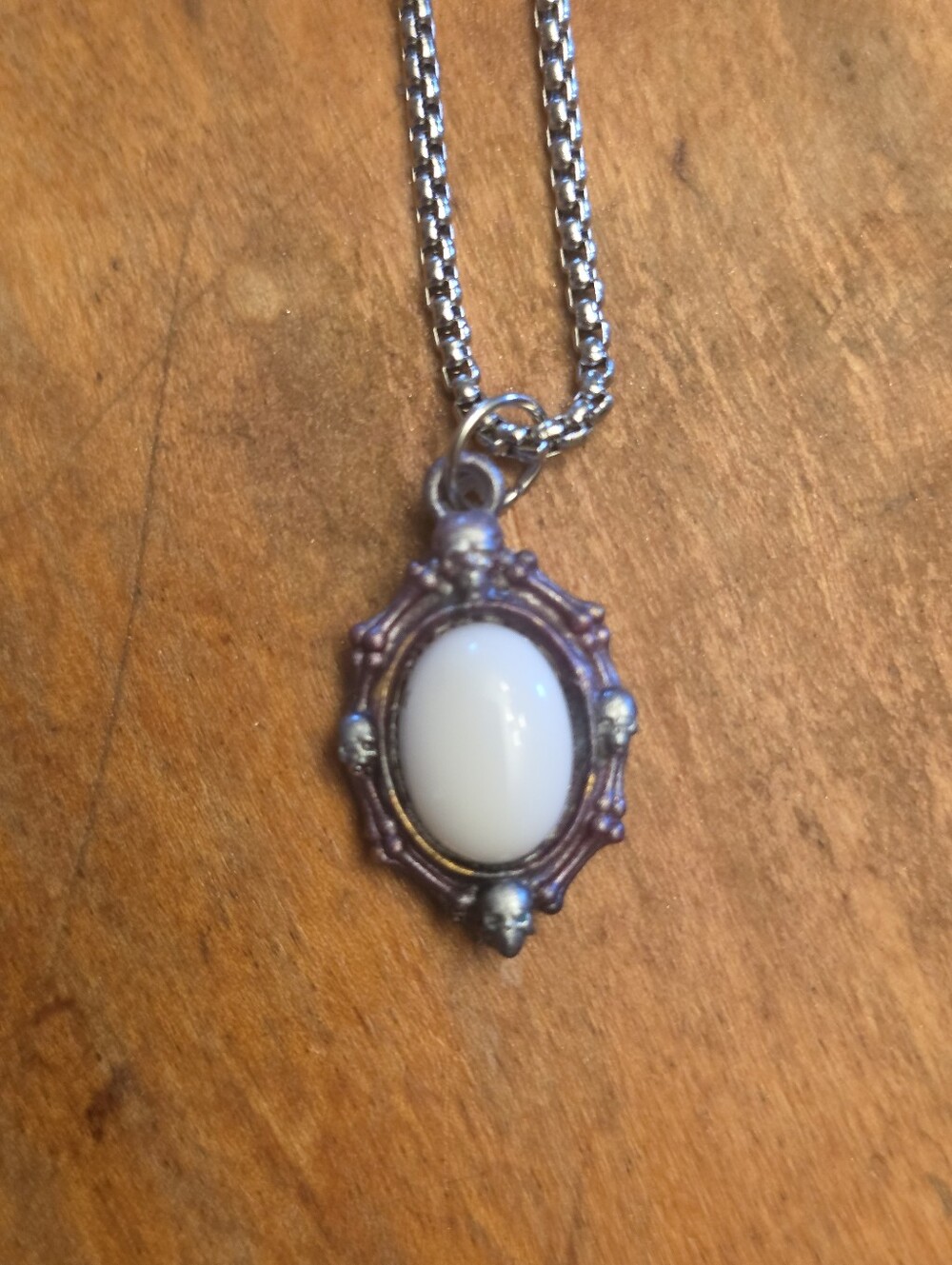 Quad Skull Resin Pendant With White Gemstone On Silver Tone Chain Necklace